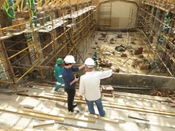 A group of people in hard hats.